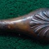 F1047  UNMARKED SHELL AND BUSH FLASK [A]
