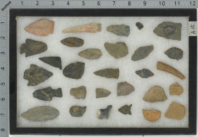 A15 COLLECTION OF SCRAPERS, ARROWHEADS, POTTERY SHARDS AND WHAT APPEARS TO BE A PIECE OF TOOTH [A]