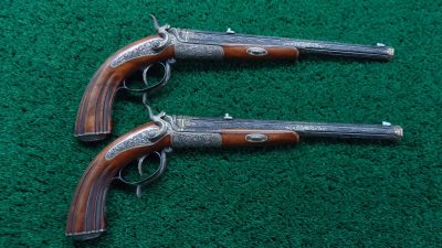 MHG973 EXTRAORDINARY PAIR EXHIBITION GRADE RELIEF ENGRAVED GOLD INLAID TARGET PISTOLS [A]