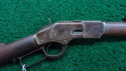 W4222 WINCHESTER MODEL 1873 RIFLE WITH 28 INCH BARREL IN 32 WCF [M]