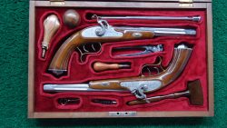 MHG1087 CASED PAIR OF REPRODUCTION PERCUSSION DUELING PISTOLS [A]