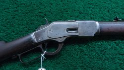 W4566 WINCHESTER MODEL 1873 RIFLE IN 32 WCF WITH 32 INCH BARREL [A]